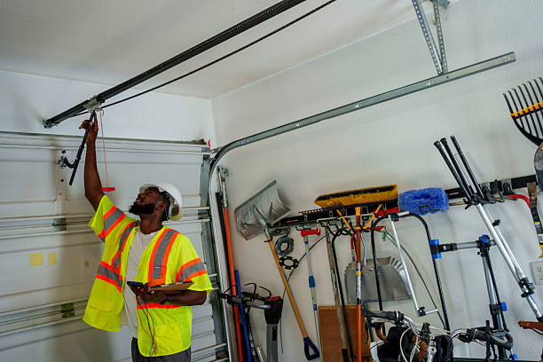 Professional Garage Door Panel Replacement technician working in Steep Falls, ME